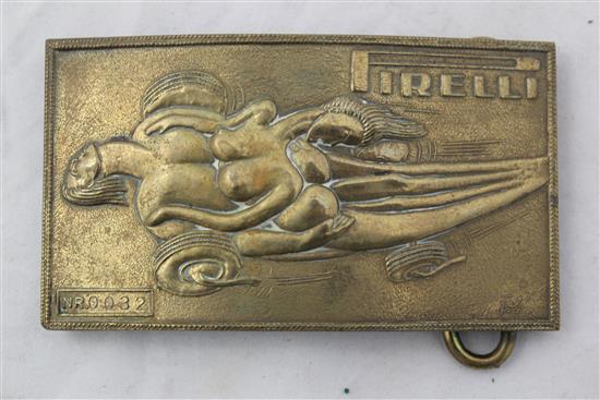 A Salvador Dali for Pirelli brass belt buckle, 4in., in original Deane & Adams box